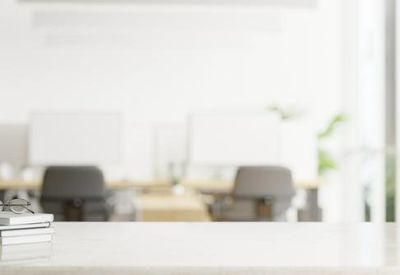 Brightly lit workstation area with neutral tones and minimalist decor.