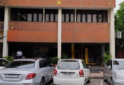 Exterior view of the brick facade building at SCO 301-302, 35B, Sector 35, Chandigarh.