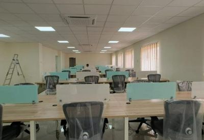 Spacious open-plan office workspace at 20/A31, Sipcot IT park with rows of modern desks and ergonomic chairs.