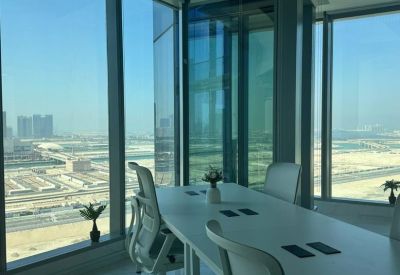 Meeting room with chairs and expansive city views.
