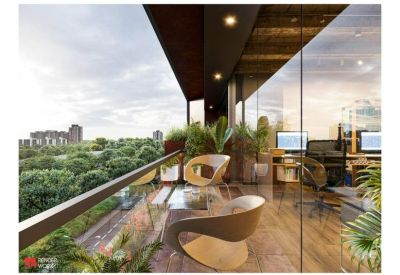 Inviting outdoor balcony lounge with designer chairs and a panoramic city view