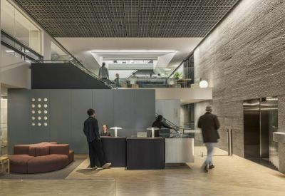 Entrance lobby of 55 Collins Street with modern decor and a reception desk