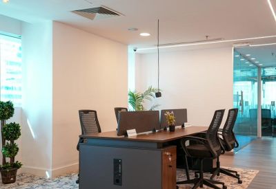 Professional workstation cluster featuring privacy screens and integrated power modules.