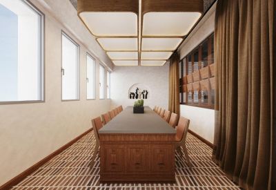 Formal boardroom with a long wooden table under a stylish recessed lighting grid.