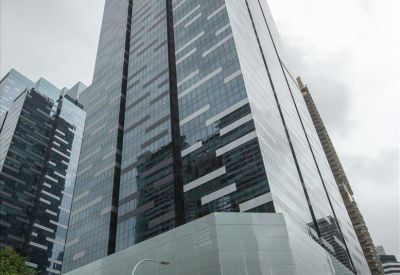 A dramatic low-angle view of the glass skyscraper facade at Asia Square, Tower 1, 8 Marina View.