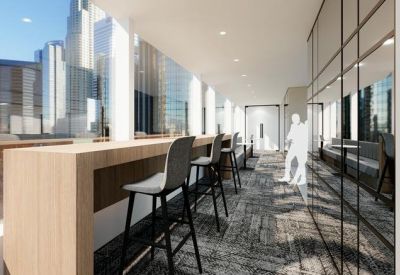 Modern workspace area with a wooden breakfast bar and stools overlooking the city skyline.