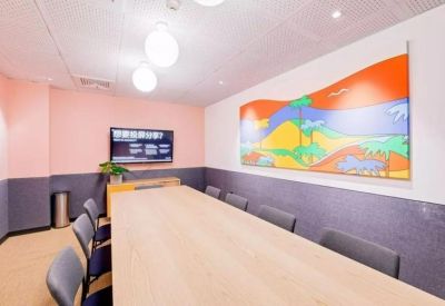 A professional meeting room at Phase I, IFC, 351 Jiang Dong Middle Road with a colorful landscape mural.