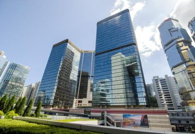 Low-angle exterior view of the glass-facade skyscrapers at Admiralty Centre Tower 1.