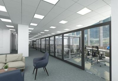 Spacious open-plan area with private glass booths and bright ceiling lights.