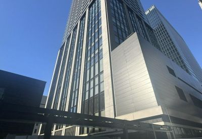 Exterior view of the soaring glass and steel skyscraper at Level 11-12F, 2-3-8 Hamamatsucho, Minato City.