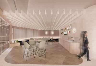 Modern communal dining area featuring a light wood bar table and radial ceiling slats.