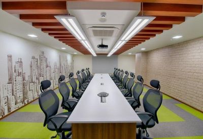 Professional boardroom with a long white table, ergonomic chairs, and a city skyline mural.