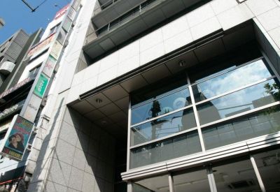 Exterior view of the Roppongi-Mikawadai Building 7F showing the modern facade and entrance.