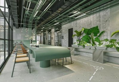 Long conference room with modern chairs and artwork.
