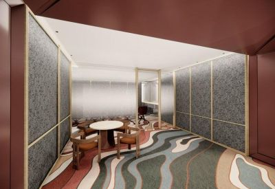 Small meeting room featuring acoustic wall panels and a wave-patterned carpet.