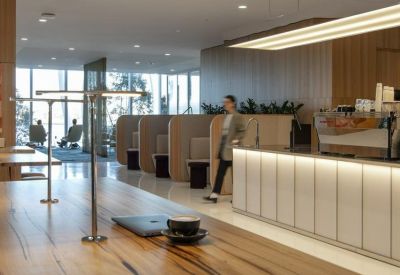 Lounge area with a coffee bar and seating options.