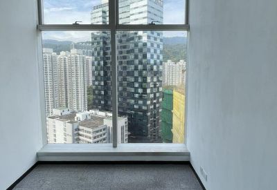 Private office suite with floor-to-ceiling windows offering city and mountain views.