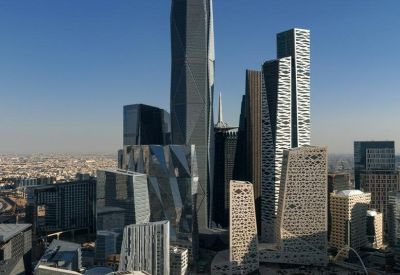 Exterior view of the geometric high-rise towers at Level 7, Building 4. 07, Al Aqiq.