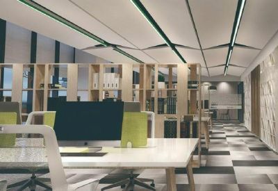 Professional workspace with sleek desks and a decorative slatted partition.