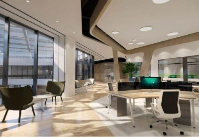 Open-plan office area with modern desks, ergonomic chairs, and large windows providing natural light.
