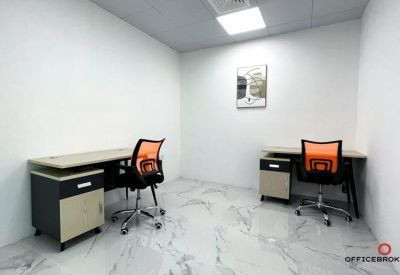 Two-person office suite with marble-patterned flooring and minimalist desks.