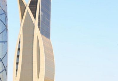 Exterior view of the distinctive petal-shaped glass Burj Rafal tower on King Fahd Branch Road, Alyasmin.