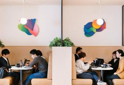 Private breakout booths with colourful wall art and integrated seating.