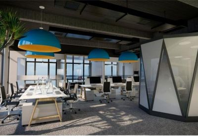 Open-plan office with white desks, teal pendant lights, and a geometric frosted glass pod.