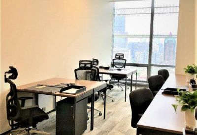 Bright four-person office suite with ergonomic chairs and city views.