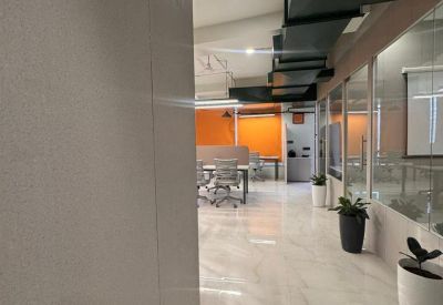 Polished marble hallway and glass offices at Luthra tower 1st Floor ITBPGMS Road Dehradun.