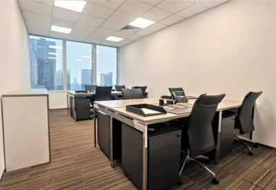 Modern private office suite with black desks and city views through floor-to-ceiling windows.