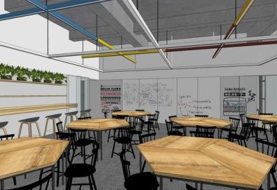 Modern meeting room featuring hexagonal wooden tables, black chairs, and whiteboard walls.
