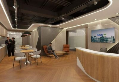 Modern reception area with wood-paneled desk, lounge seating, and a kitchenette.