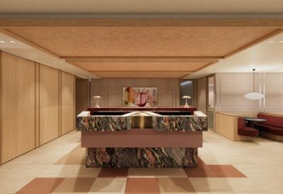 Branded reception desk featuring a distinctive marble finish and wood-panelled ceiling.