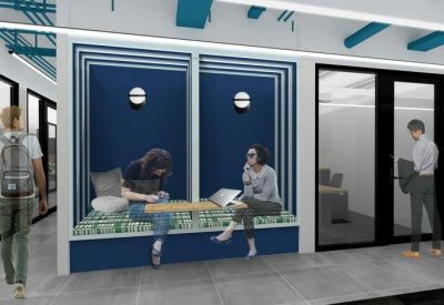 Private phone booths or seating nooks with navy blue walls and patterned cushions.