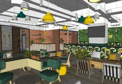 Lounge area with velvet green armchairs, striped seating, and a large wall-mounted screen.