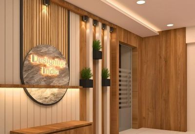Reception area featuring a branded stone plaque and vertical wooden slats.