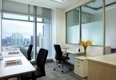 Private three-person office suite with city views and glass partitions.