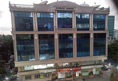 Exterior view of the glass-facade Everest Grand building in Mumbai.