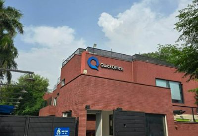 Exterior brick facade and entrance of QuickOffice, 304 Upper Mall, Lahore, Pakistan.
