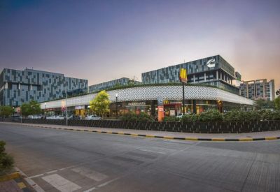 Exterior view of the modern patterned facade at Redbrick Offices, Panchshil Business Park.