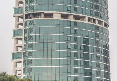 Exterior view of the glass-facade The Corporate Park building with a curved design.