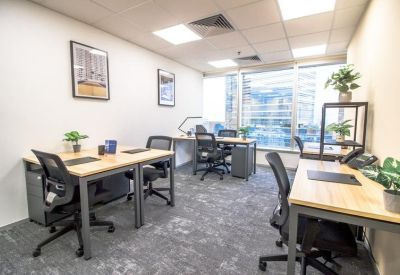 Private office with three desks and a large window view.