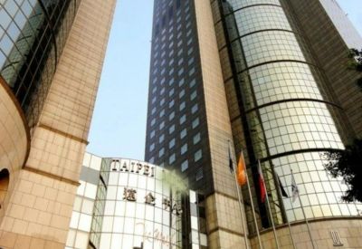Exterior view of the towering glass facade at No. 207, Section 2, Tun Hwa South Road, Taipei.