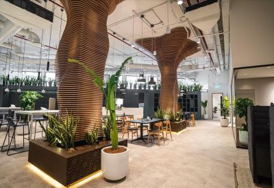 Spacious communal lounge at Prince Turki Ibn Abdulaziz Al Awwal Road, The Esplanade with unique tree-like columns.