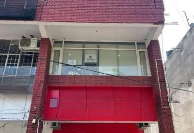 Exterior view of the brick facade at SCO 224, Level II, Sector 37-C, Chandigarh.