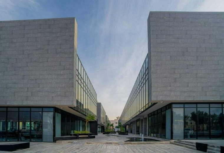 Exterior view of the modern office complex on Prince Muhammad Ibn Saad Ibn Abdulaziz Road.