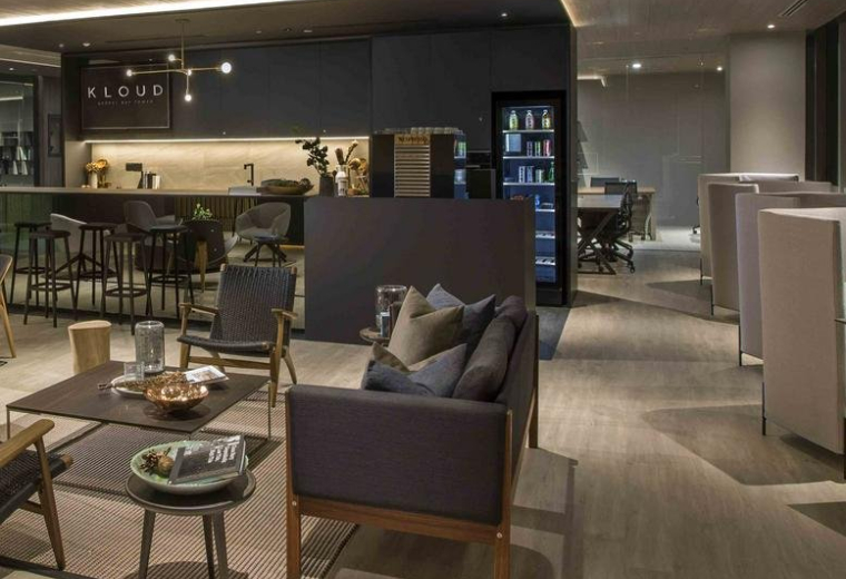 Spacious communal lounge and cafe area at 1 HarbourFront Avenue, Level 13, Singapore.