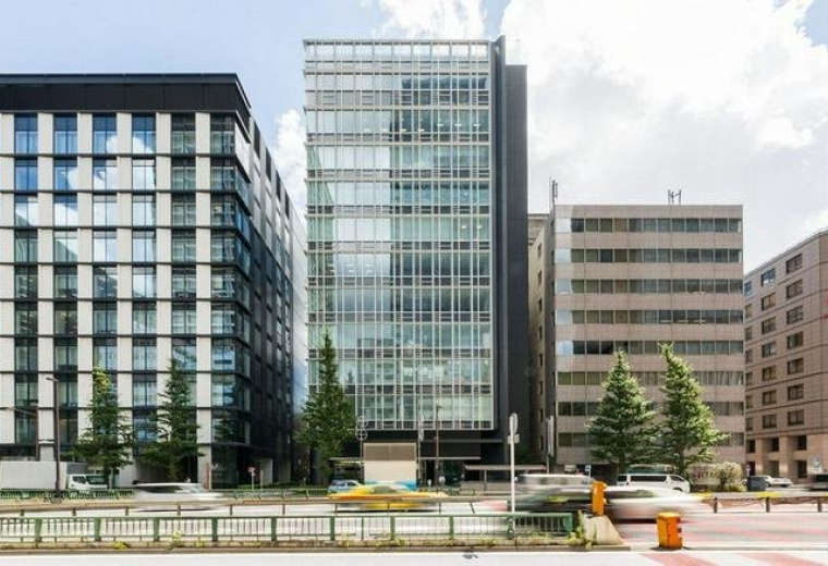 Exterior view of the modern glass facade at Nippon Life Nihonbashi Building.