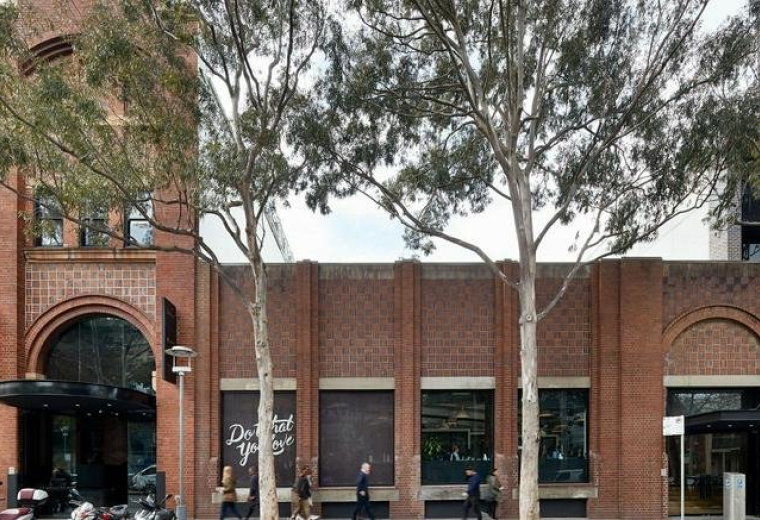 Exterior view of the heritage brick facade at 100 Harris Street, Pyrmont.
